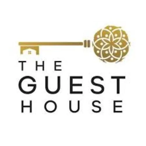 The Guest House Ocala logo